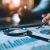 charts and magnifying glass